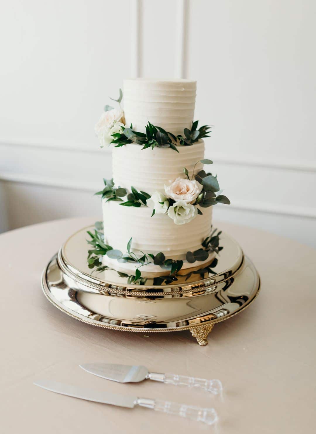 Beautiful simple wedding cake with eucalyptus and roses for earthy summer garden wedding in September, neutrals & greenery