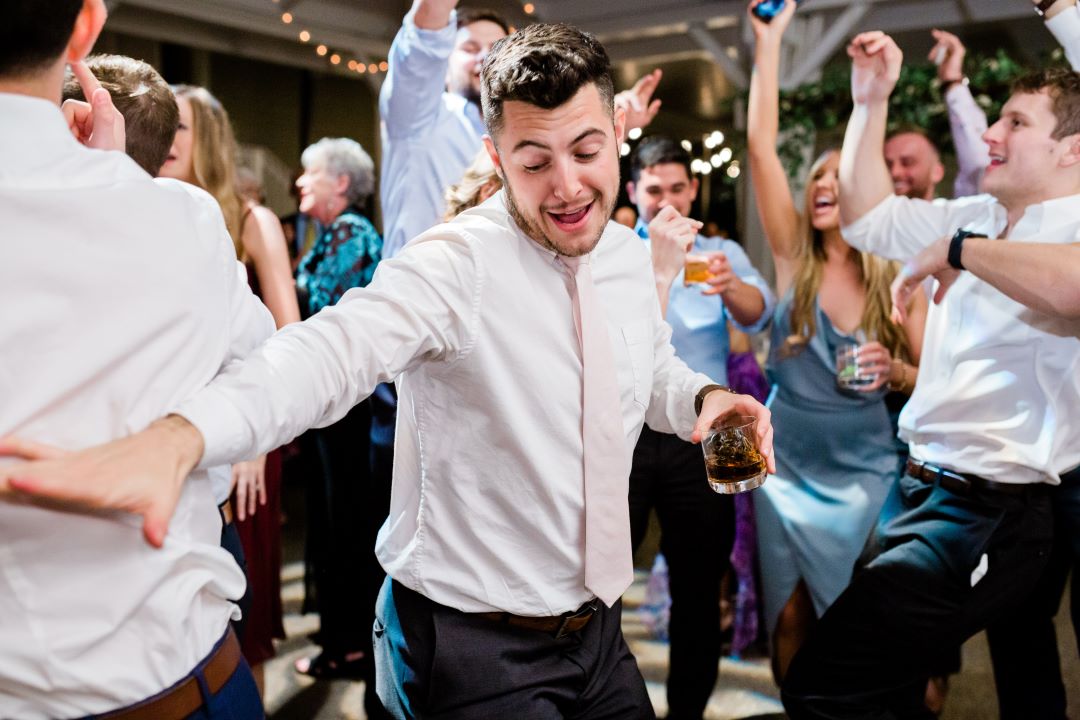 CJ's Off The Square | Wedding guests dancing and having fun
