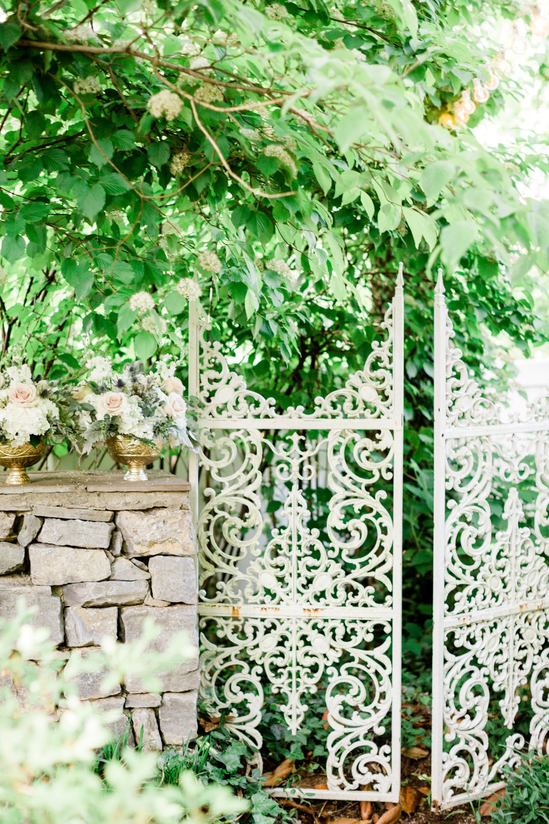 CJ's Off The Square | Intricate gate in the garden of the wedding venue