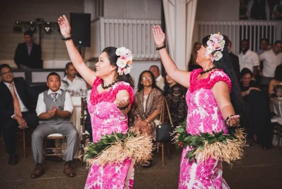 The groom’s family is from Hawaii, so the couple paid homage to traditional Hawaiian culture by incorporating Hawaiian wedding traditions into their ceremony and reception.