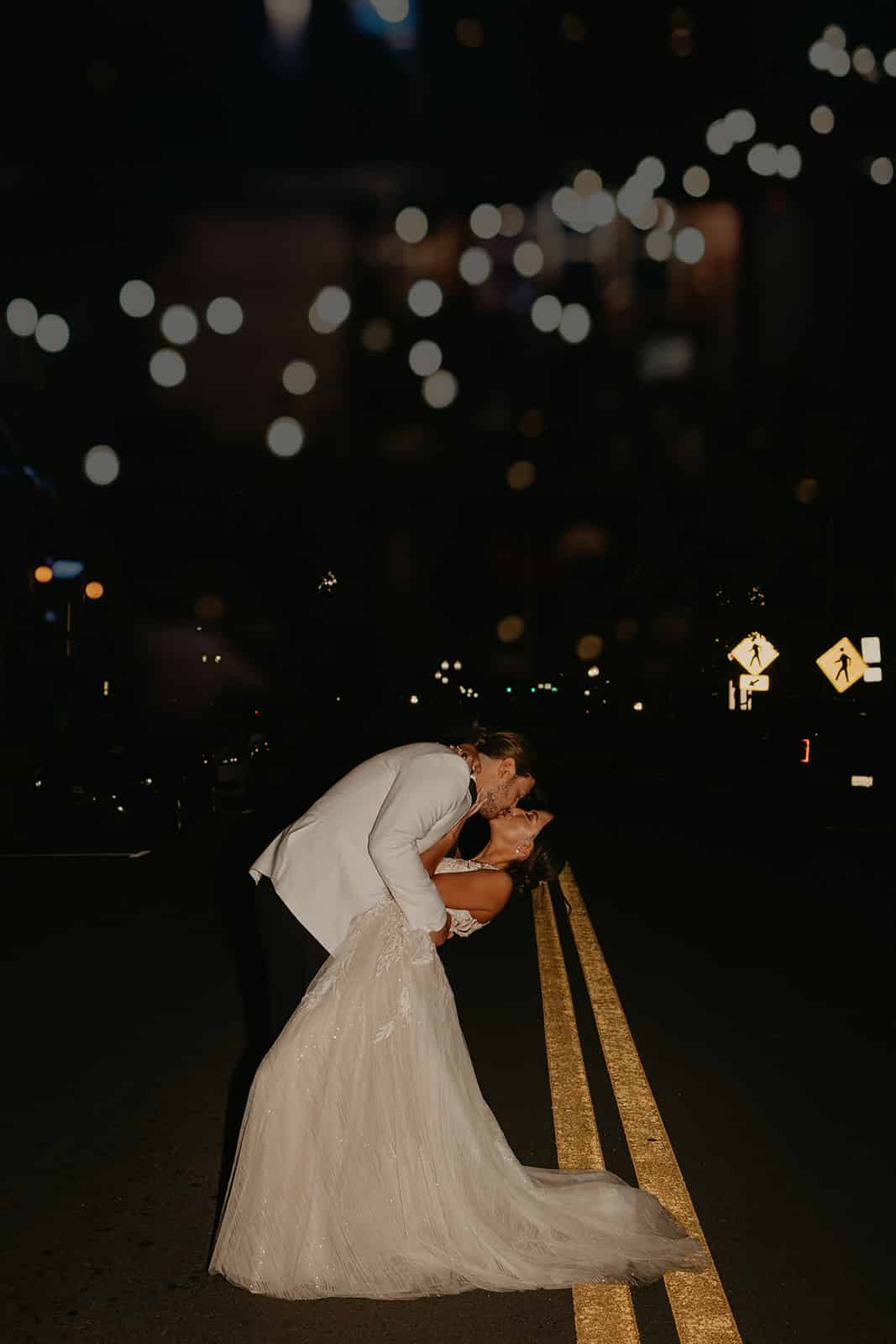bride and groom on Main Street in Franklin, TN
