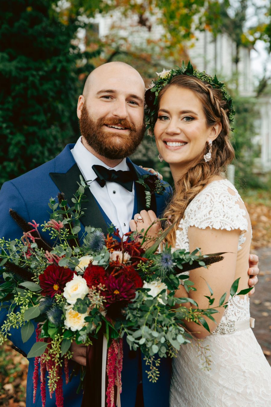 Bride and groom smiling for portraits / earthy / fall / October / burgundy