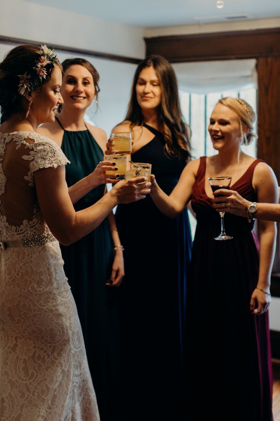 Bridal party cheersing in bridal suite before wedding / earthy / fall / October / burgundy