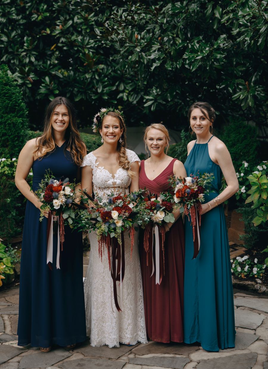Bridal party in mismatched gowns holding gorgeous fall bouquets / earthy / fall / October / burgundy
