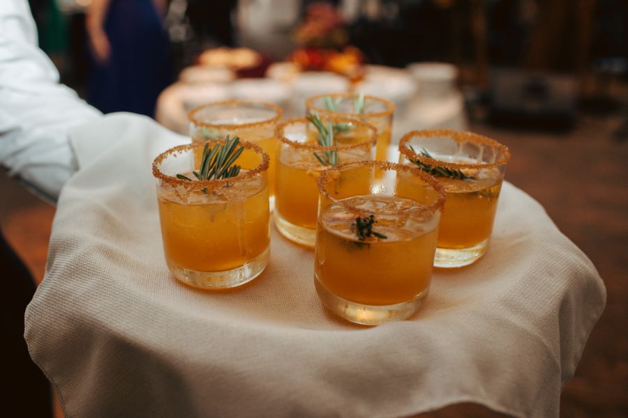 Signature cocktails on tray during wedding reception / earthy / fall / October / burgundy