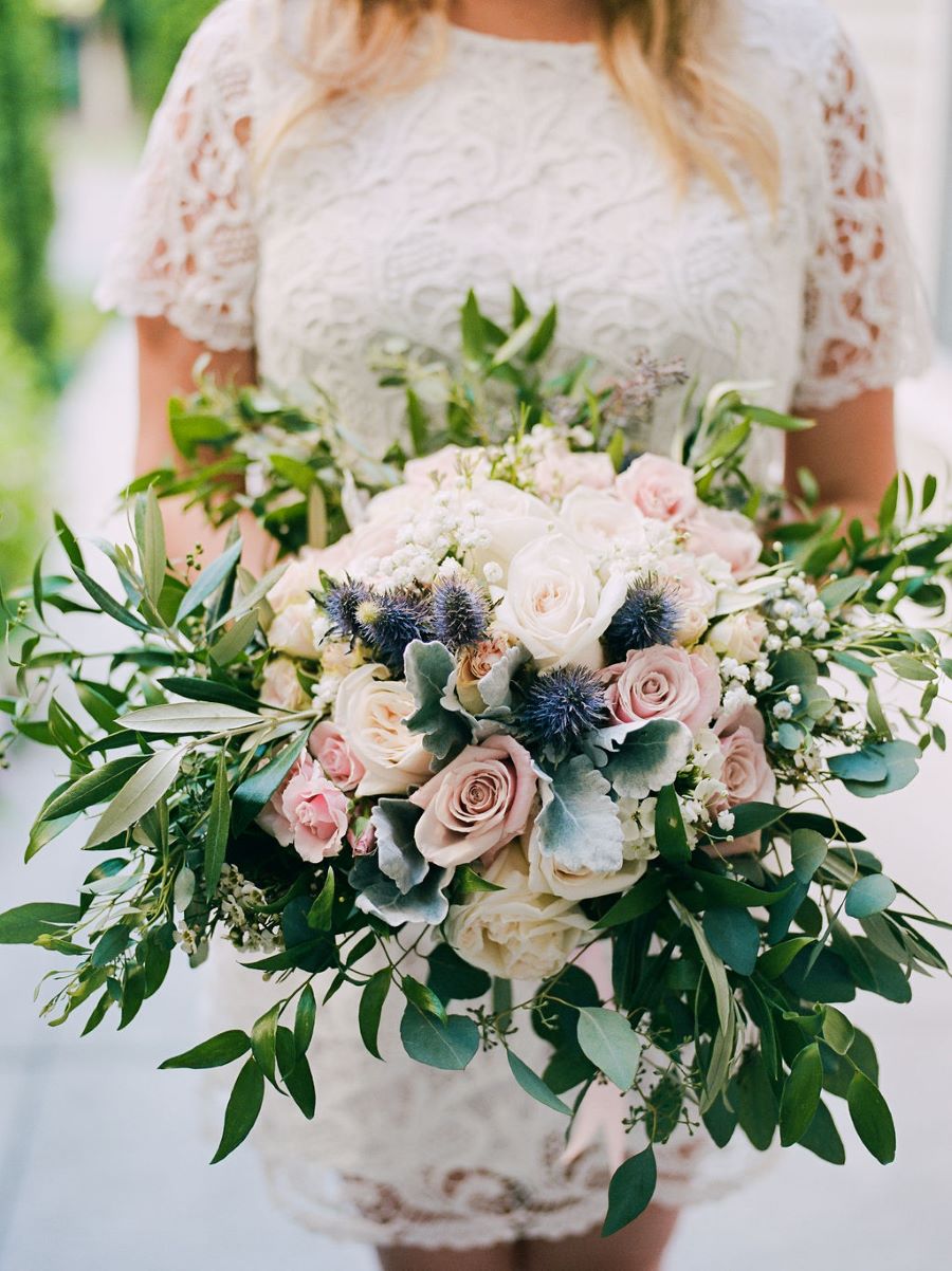 Close up of bridal bouquet and second lace dress / elopement / summer / june / blush