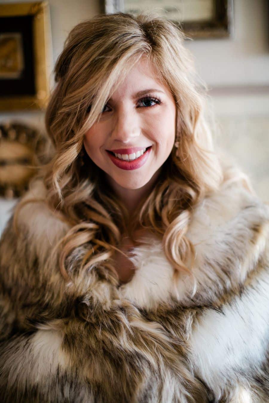 Bride smiling with fur caplet on and curled hair / Elopement / Spring / March / Dusty Rose