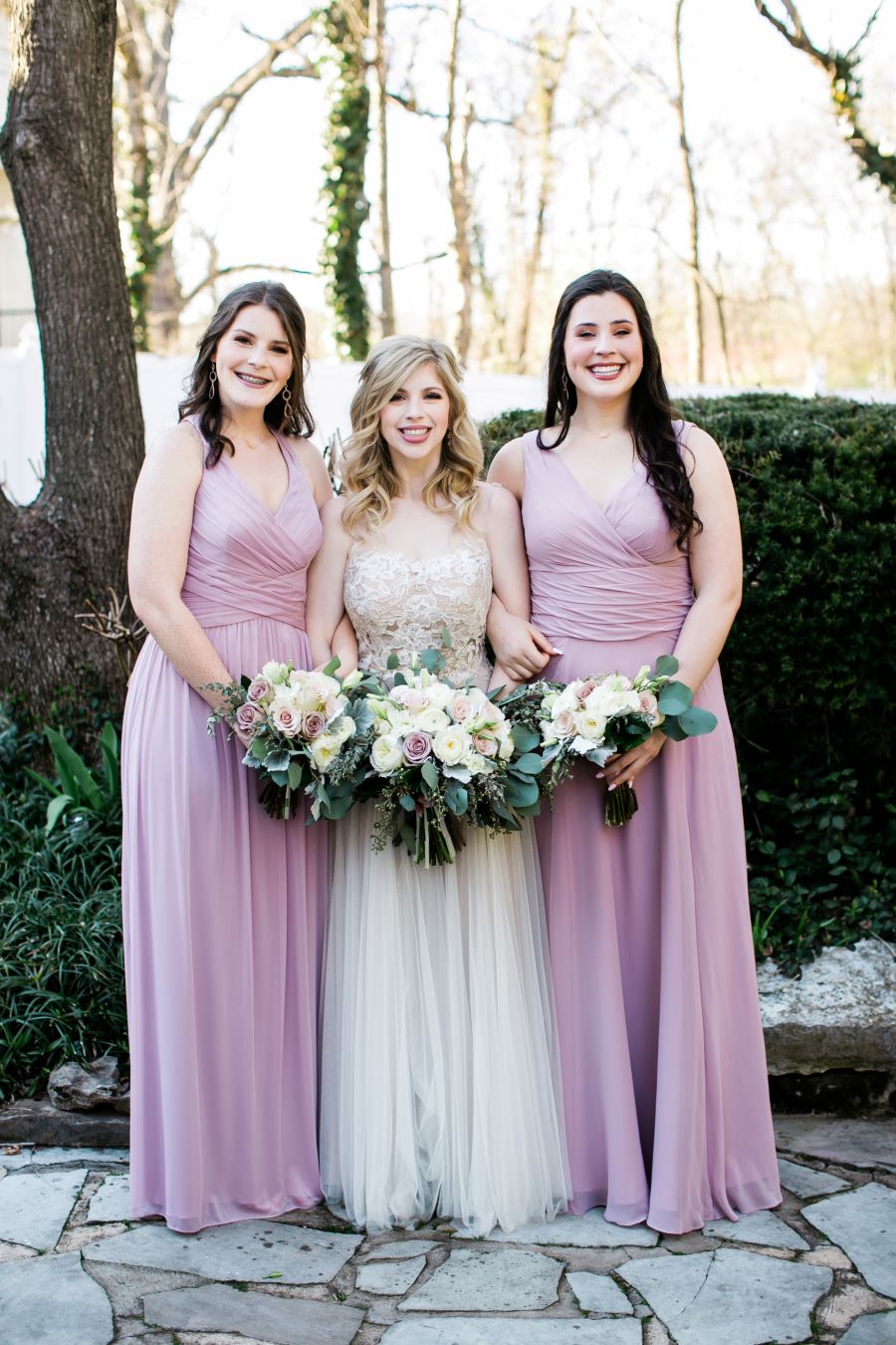 Bride and two bridesmaids in the garden / Elopement / Spring / March / Dusty Rose