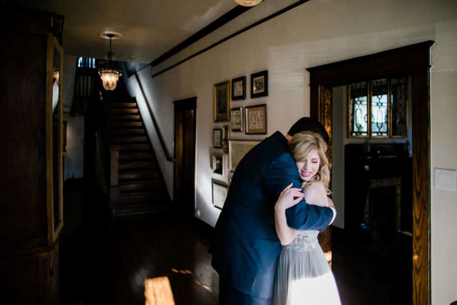 Bride and groom hugging after first look / Elopement / Spring / March / Dusty Rose