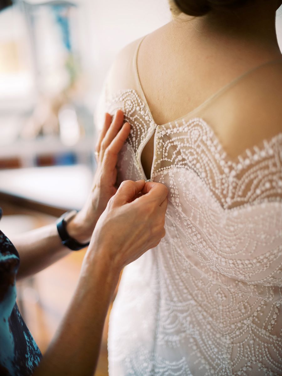 Bride's mother zipping up her dress / Elopement / Summer / August