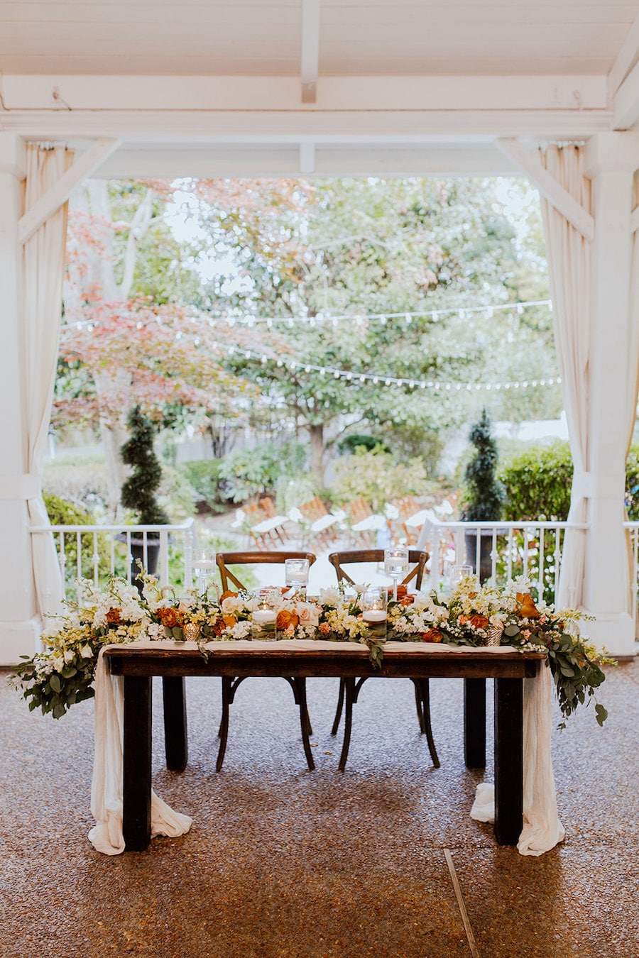 * White, Ivory, Taupe Wedding Colors with Greenery and Candles at Franklin, TN Venue