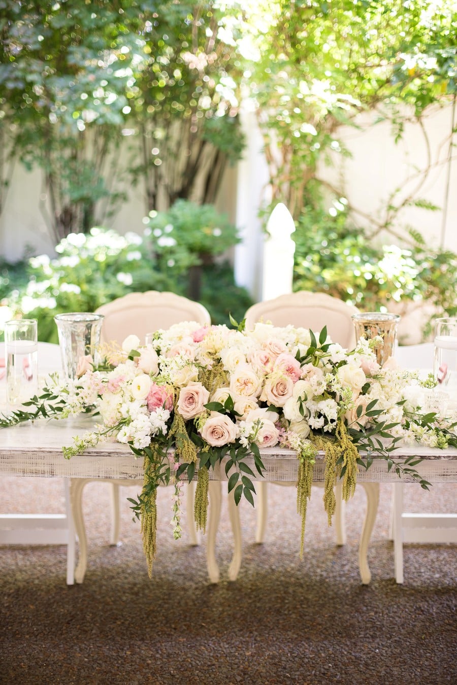 Shabby chic sweetheart table in blush, dusty rose and ivory