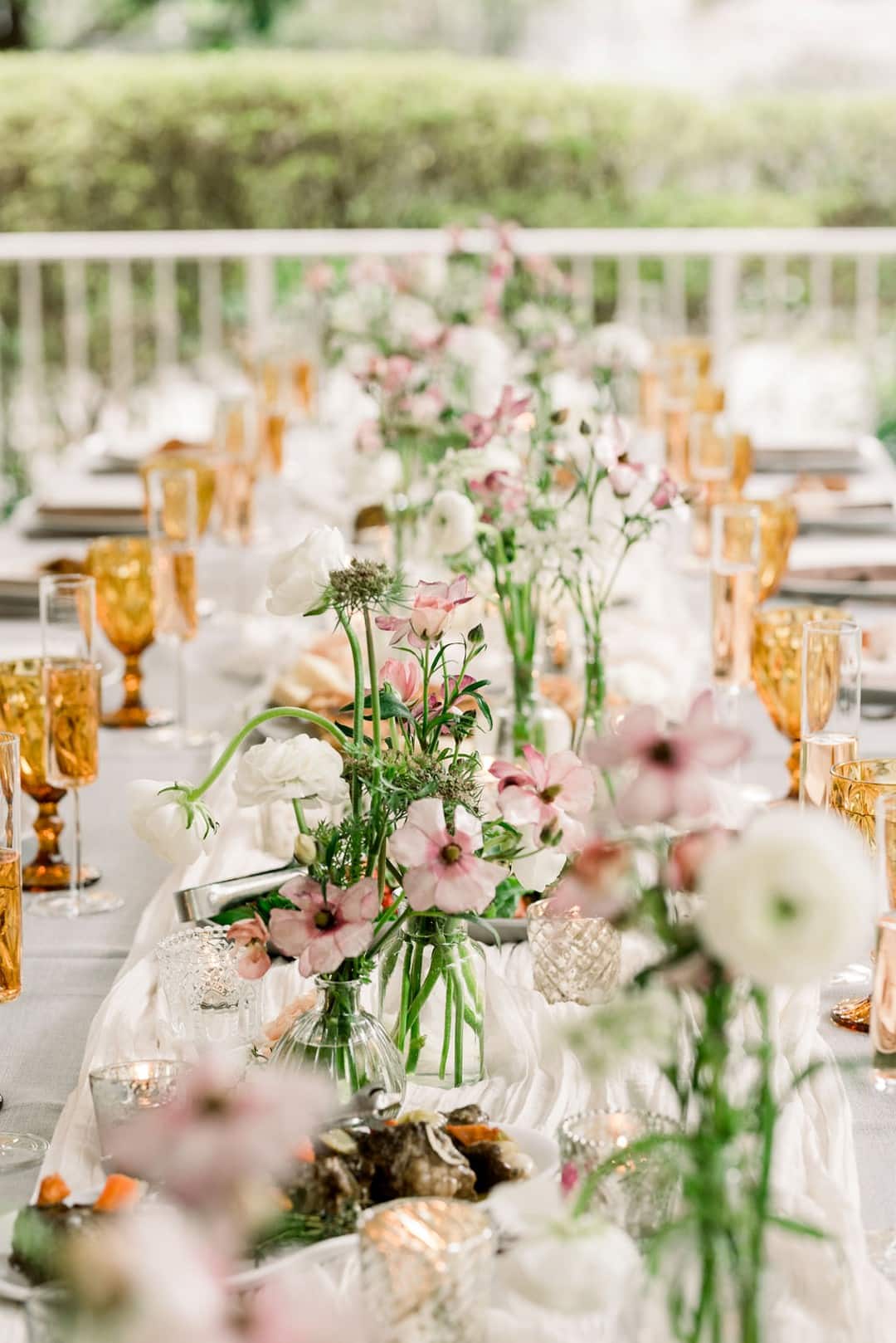 outdoor party table with amber and blush details