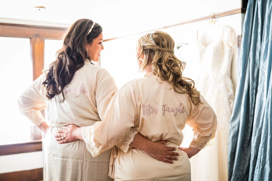 Brides wearing matching robes before their wedding in Nashville / Romantic / Summer / September / Pink / Dusty Rose / Cream
