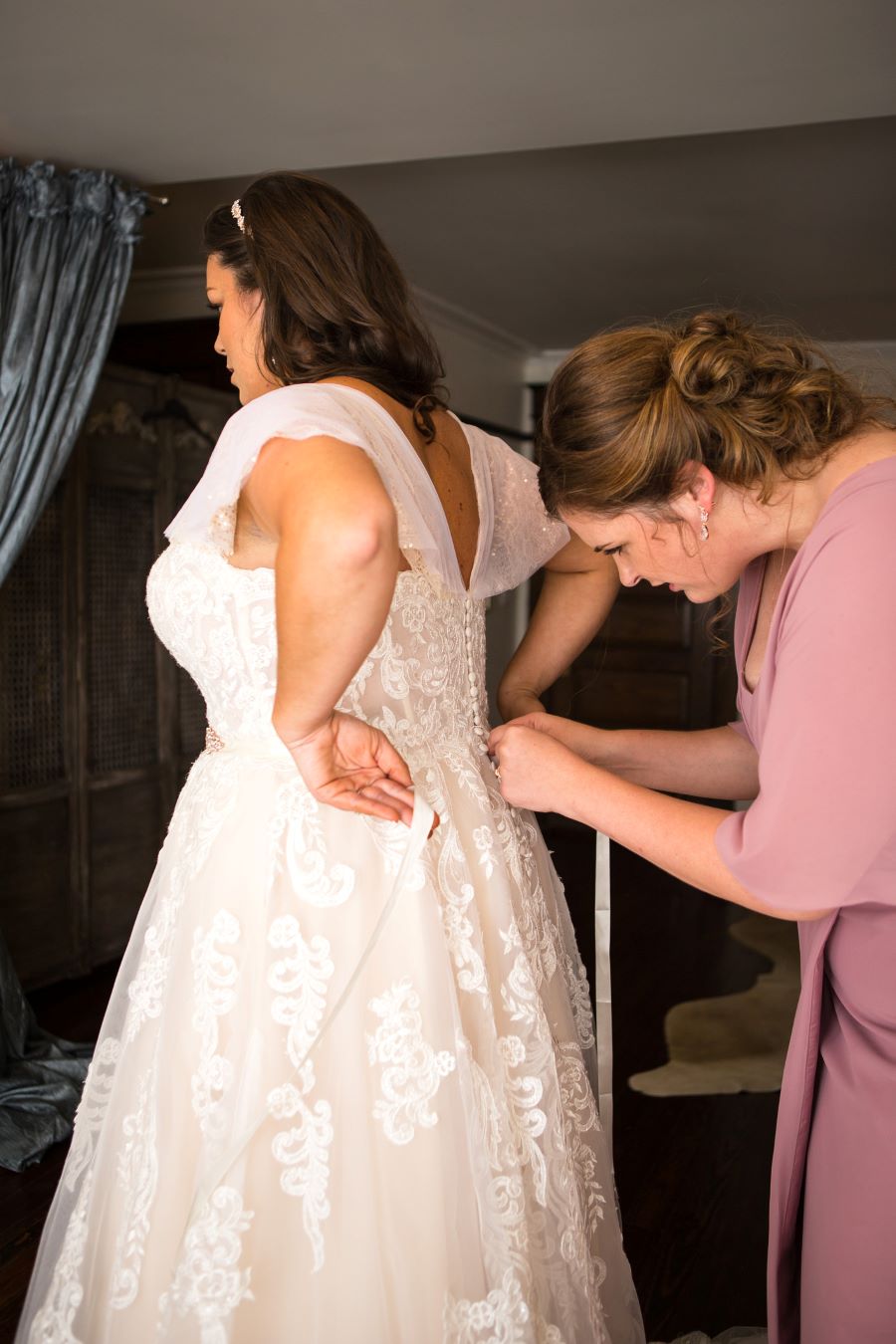 Bride being buttoned into lace wedding dress before her garden ceremony / Romantic / Summer / September / Pink / Dusty Rose / Cream