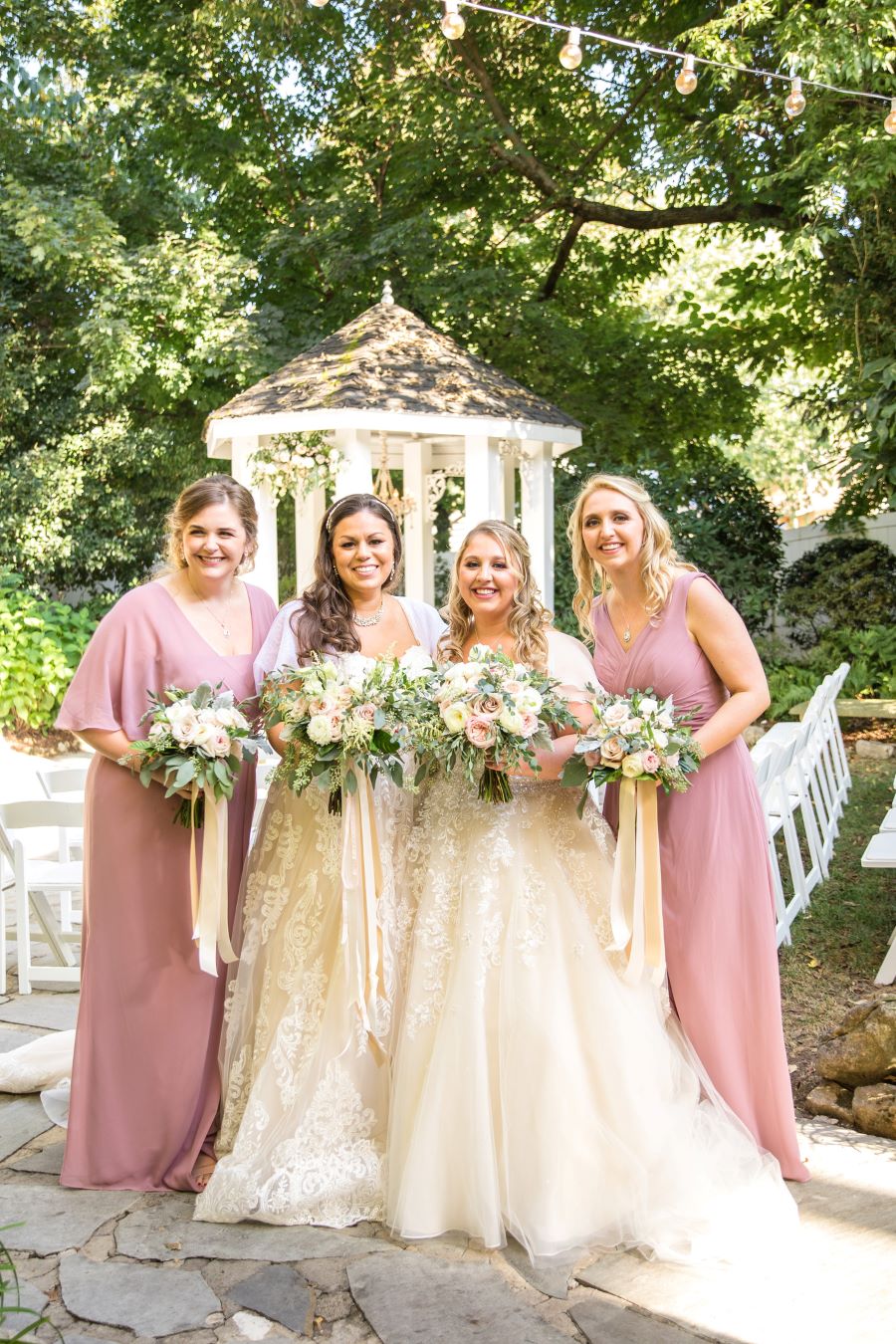 Bridal party with lace gowns and dusty rose bridesmaid dresses / Romantic / Summer / September / Pink / Dusty Rose / Cream