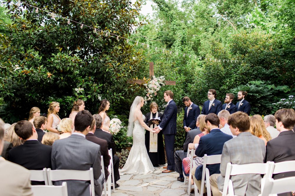 Garden wedding ceremony with cross | CJ's Off the Square