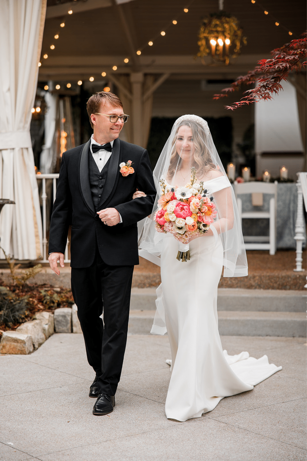 As the couple made their way down the aisle, they were greeted by a sea of bubbles, creating a whimsical and playful ambiance. The smiles on their faces perfectly captured the joy of the day, as they celebrated their love surrounded by family and friends. 