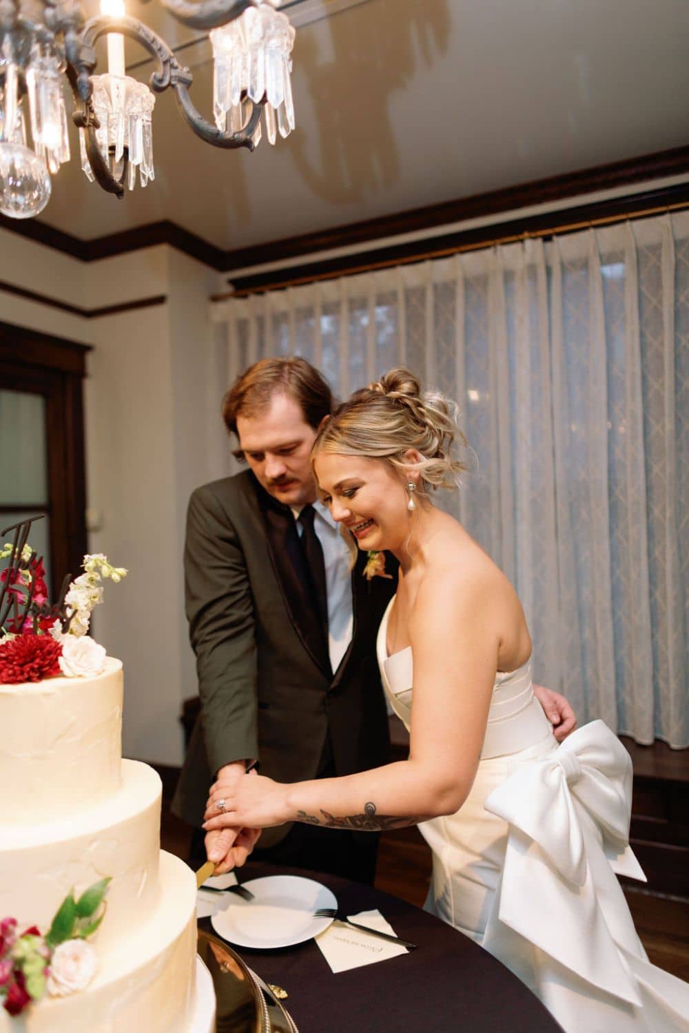 cutting wedding cake| CJ's Off the Square, Franklin, TN