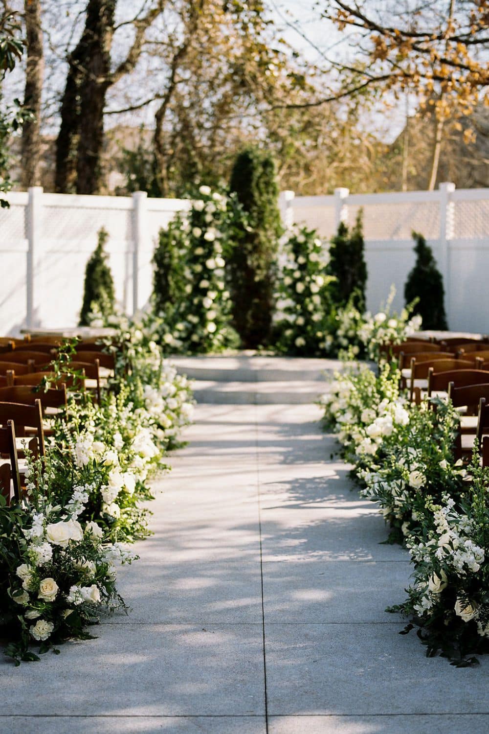 modern white wedding ceremony garden| CJ's Off the Square