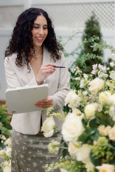 wedding planner checks floral order