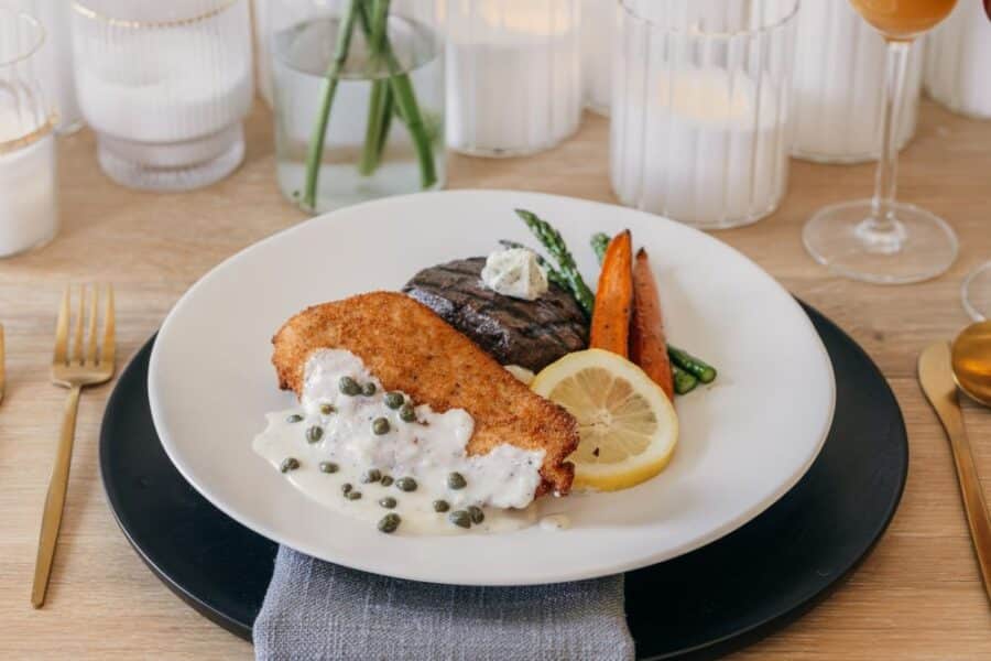 Filet of Beef + Panne Chicken with garlic whipped potatoes + roasted asparagus, and carrots