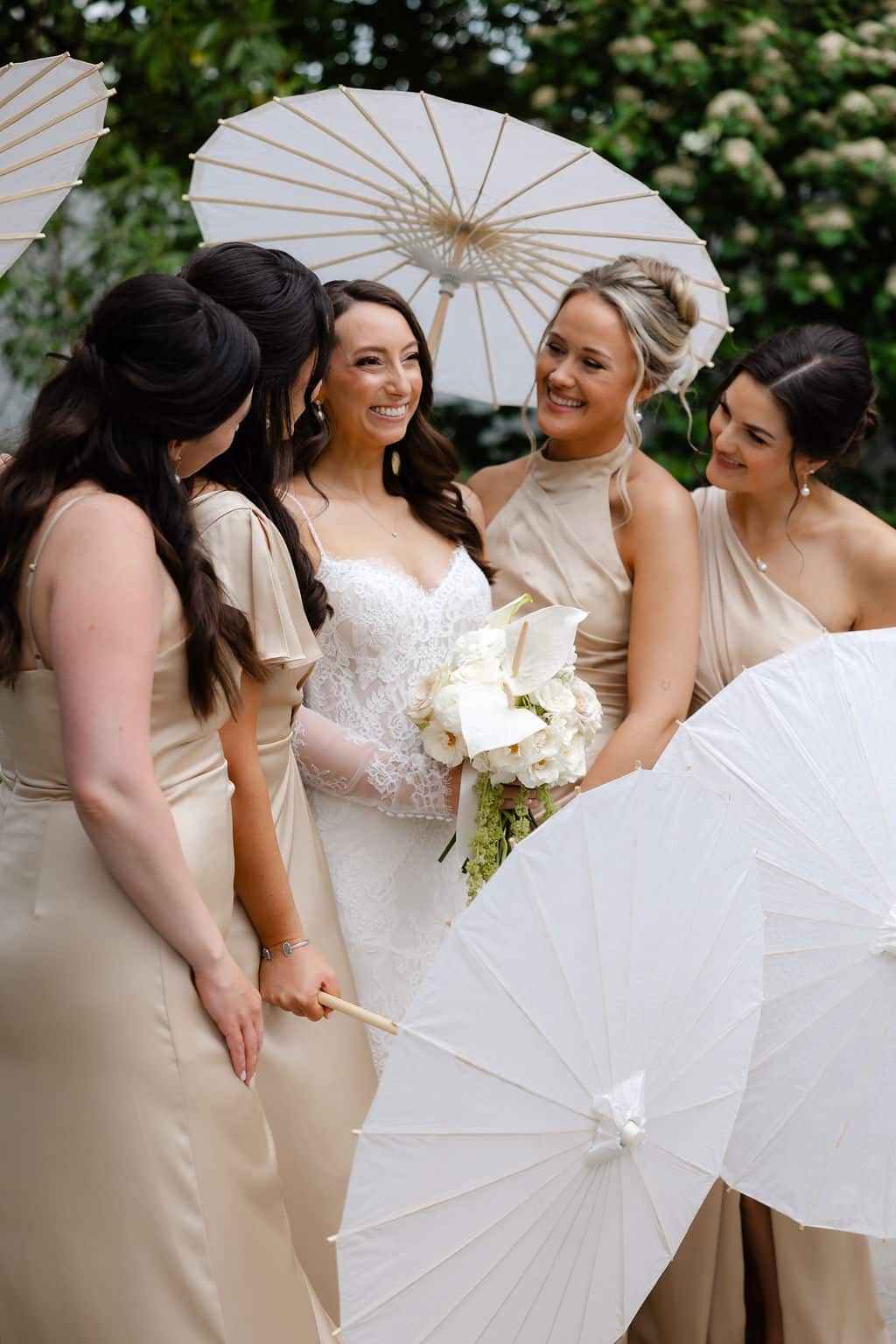 bride and bridesmaids in garden