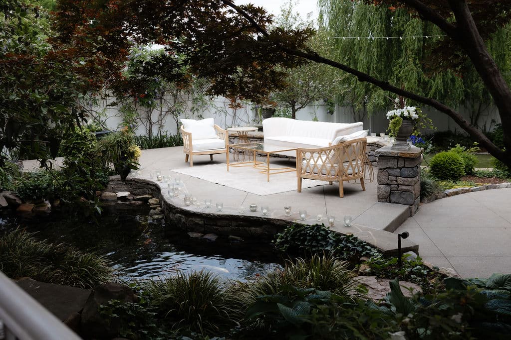 lounge furniture on pond terrace