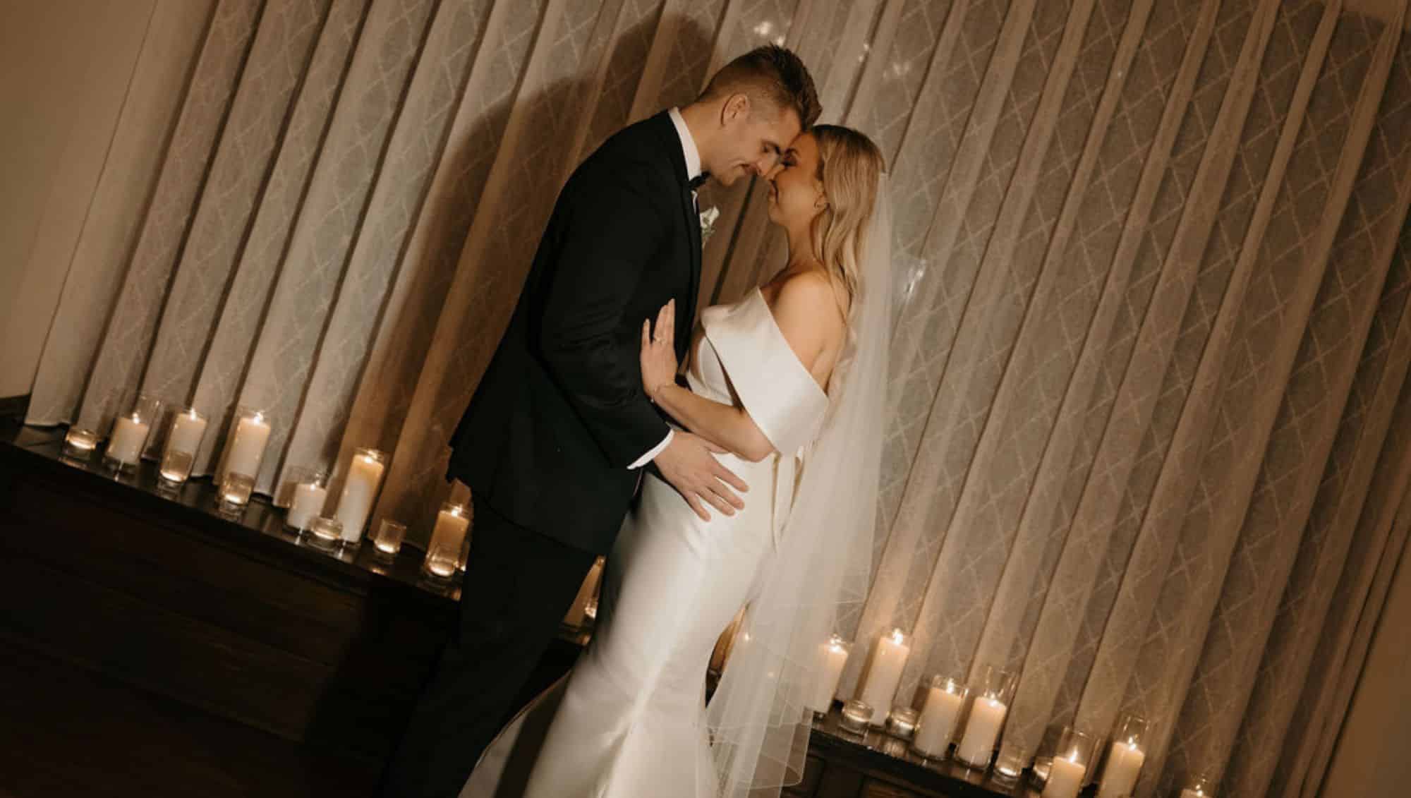 An Intimate Winter Wedding Ceremony Surrounded by Candlelight in Historic Franklin, TN
