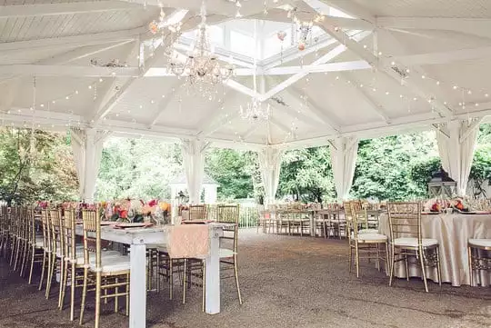 CJ's Off the Square | coral and gold garden wedding