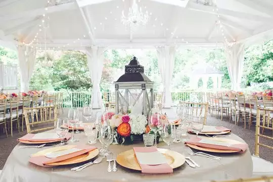 CJ's Off the Square | coral and gold garden wedding