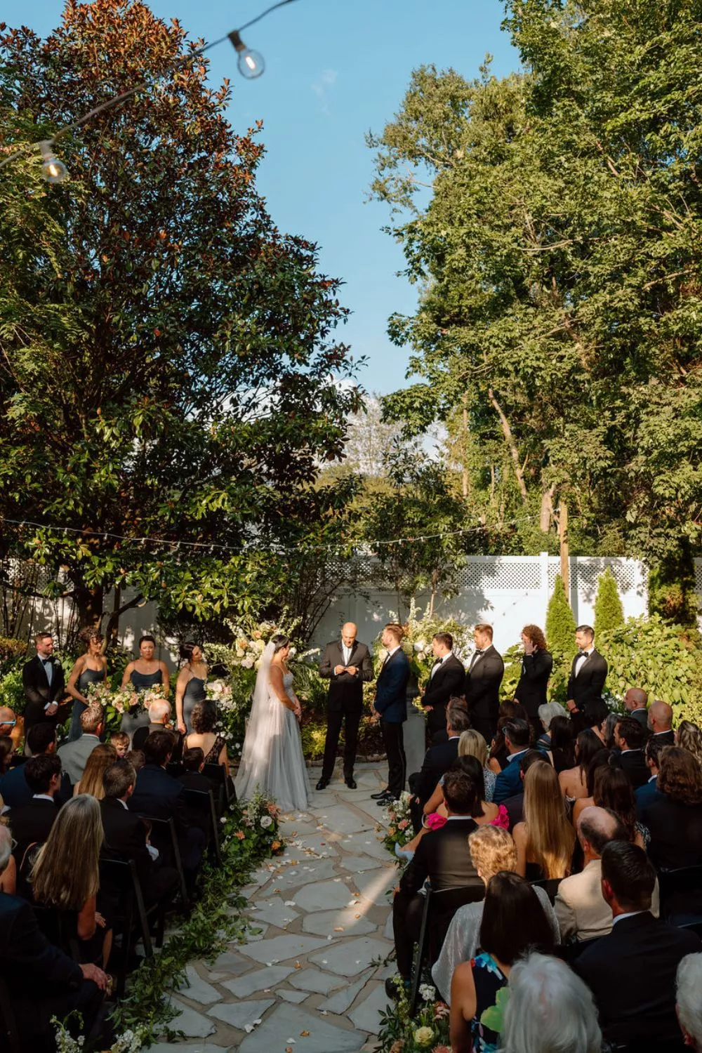 bride and groom get married in garden | CJ's Off the Square wedding venue Franklin, TN